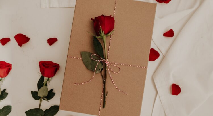 red rose on brown envelope